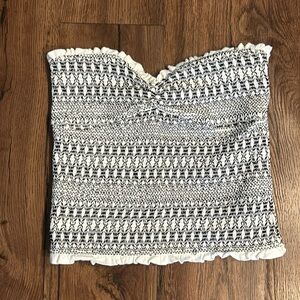 Anthropologie black and white tube top. Size XS. Ruffled edge detailing.